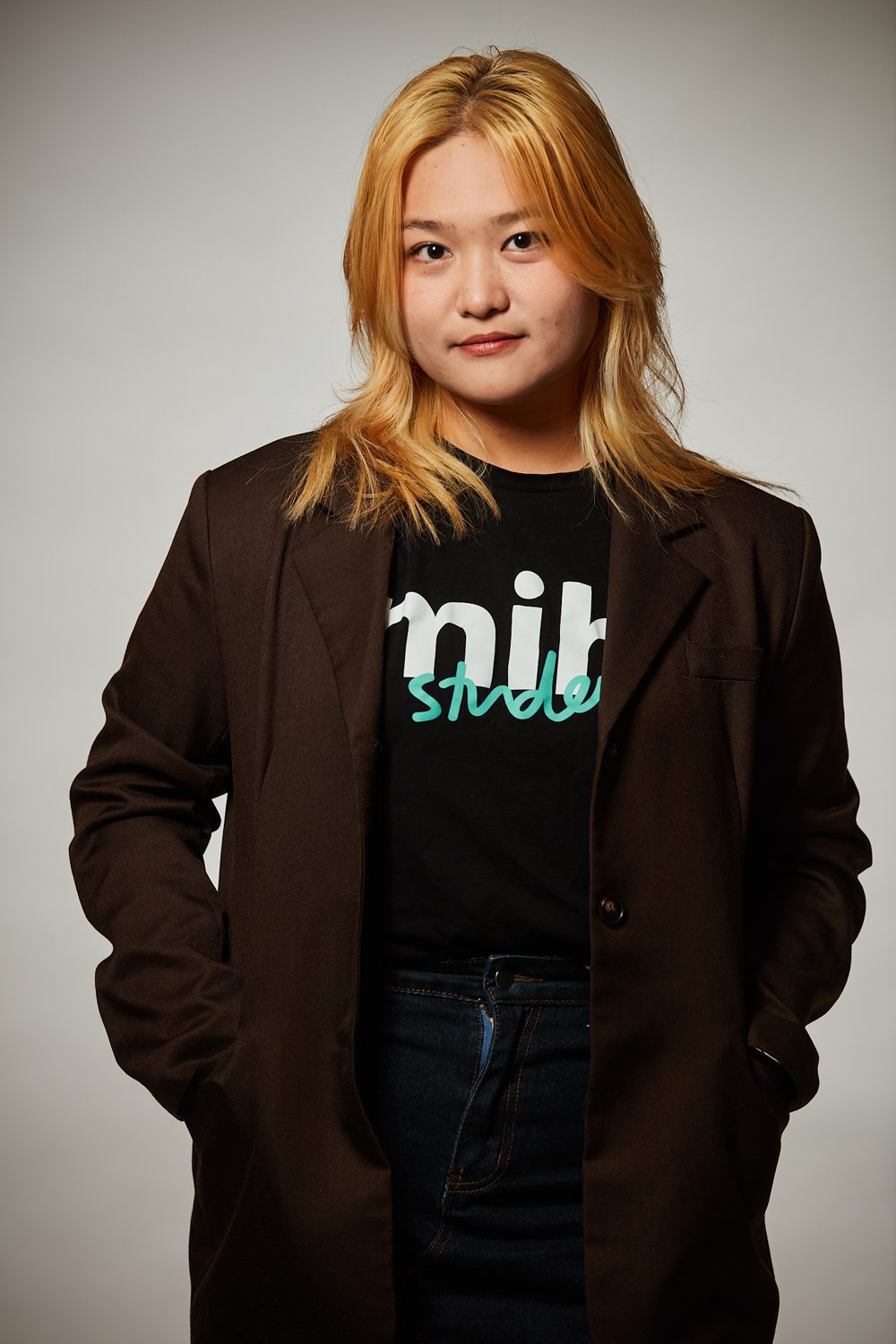 Portrait of Ekon in an MiH Student T-shirt